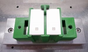 Assembly-line tool 3D printed in ABS, designed to hold switches during production process